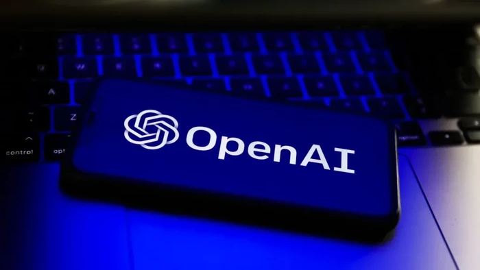 Logo OpenAI dalam latar belakang teknologi komputasi dan kecerdasan buatan